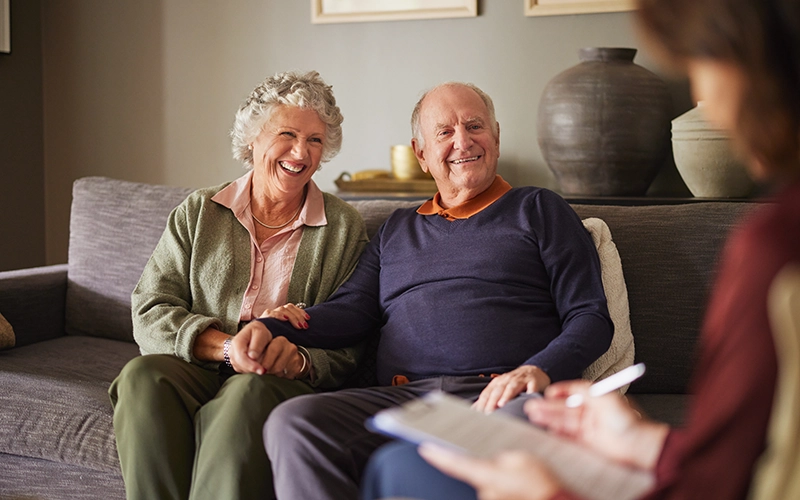 older couple with a caregiver
